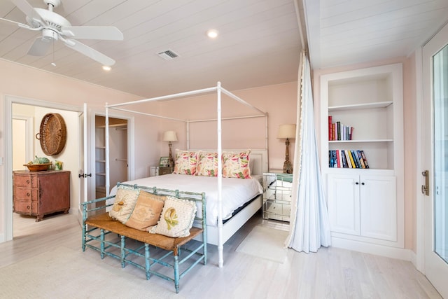 bedroom featuring ceiling fan, wooden ceiling, and light wood-type flooring