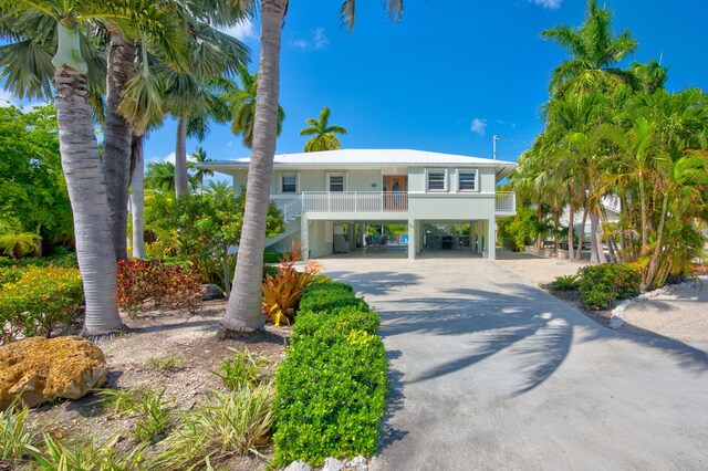 view of front of house with a carport