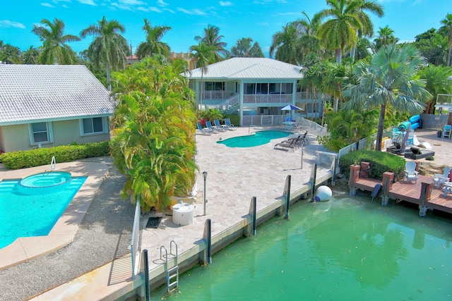 view of pool featuring a patio area