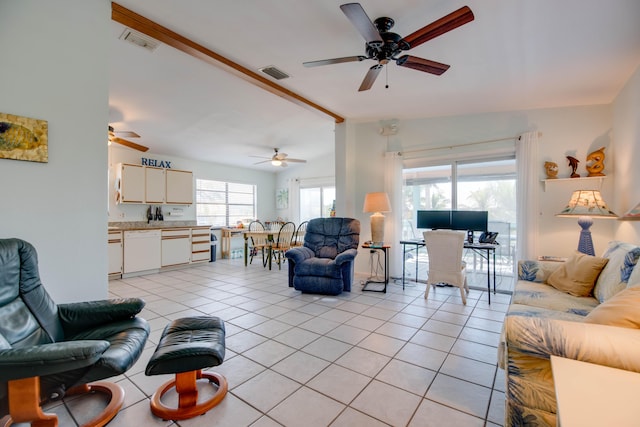 tiled living room with lofted ceiling