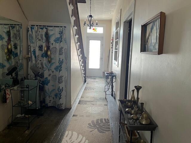 corridor featuring stairway