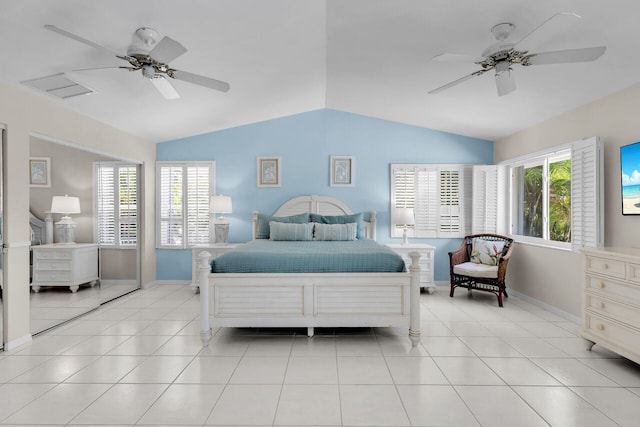 bedroom featuring light tile patterned flooring, ceiling fan, and vaulted ceiling