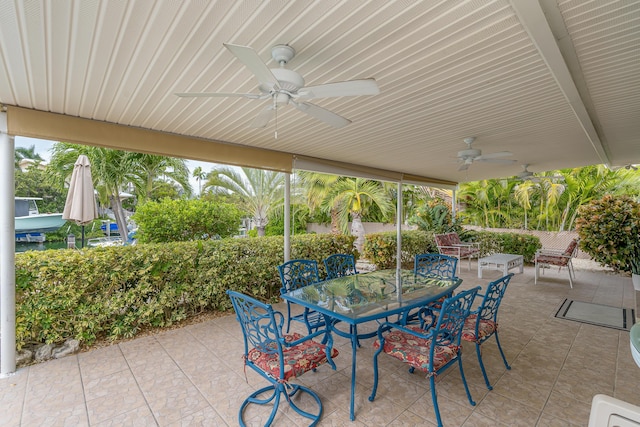 view of patio featuring ceiling fan