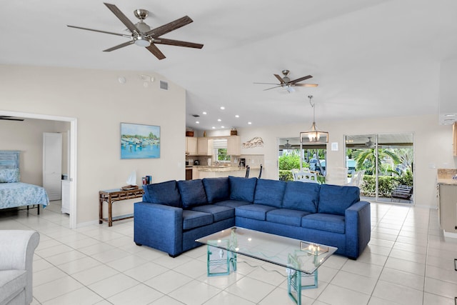 living room featuring light tile patterned flooring, ceiling fan, and lofted ceiling