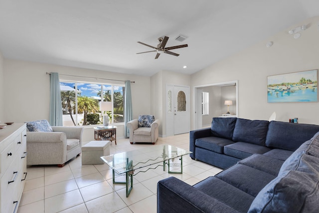 tiled living room featuring ceiling fan and lofted ceiling