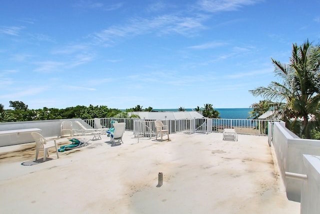 view of patio / terrace featuring a water view