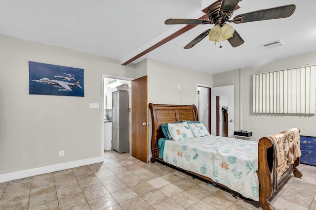 bedroom featuring beam ceiling and ceiling fan