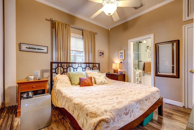 bedroom featuring ceiling fan, ornamental molding, connected bathroom, and hardwood / wood-style floors