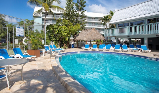 view of pool featuring a gazebo and a patio