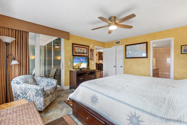 bedroom featuring connected bathroom, access to exterior, and ceiling fan