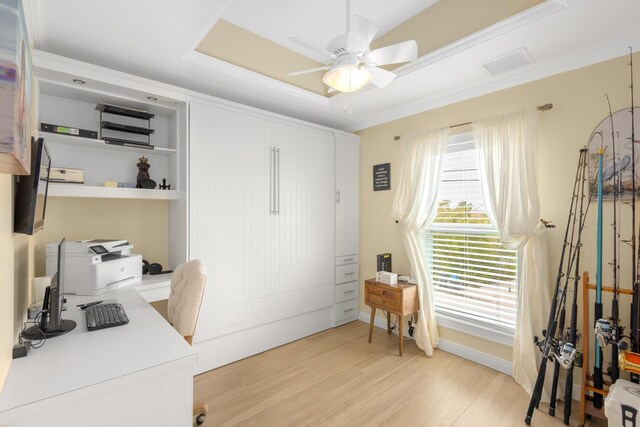 office area featuring crown molding, ceiling fan, and light wood-type flooring