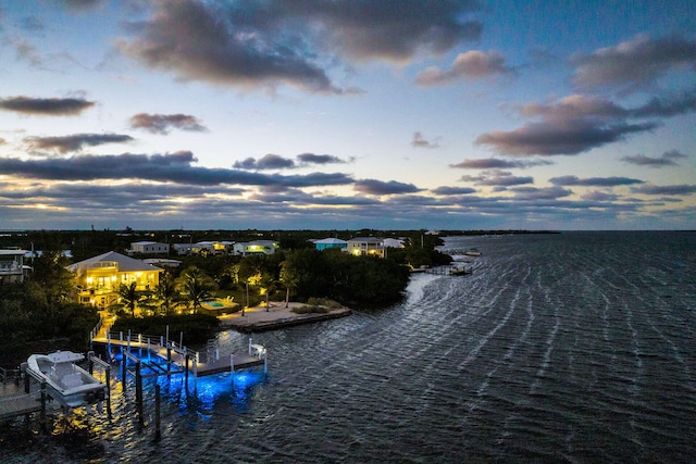 property view of water featuring a dock