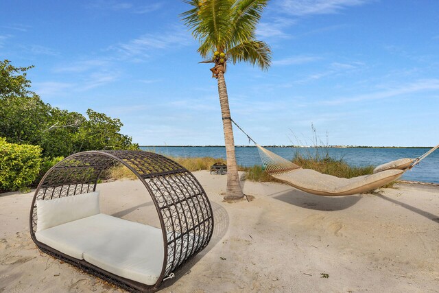 surrounding community featuring a water view