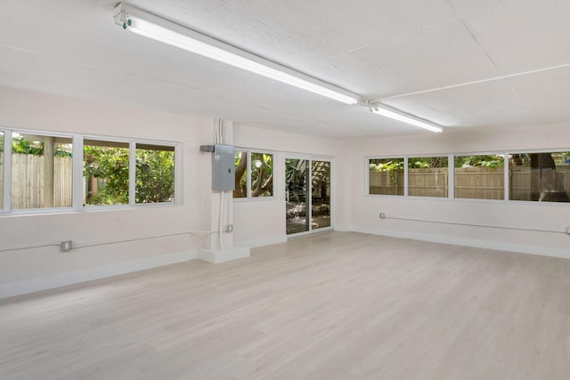 82260 Overseas Hwy, Islamorada, FL 33036 - unfurnished sunroom with electric panel and healthy amount of natural light