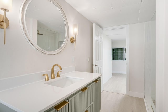 82260 Overseas Hwy, Islamorada, FL 33036 - bathroom featuring wood finished floors, vanity, and a shower