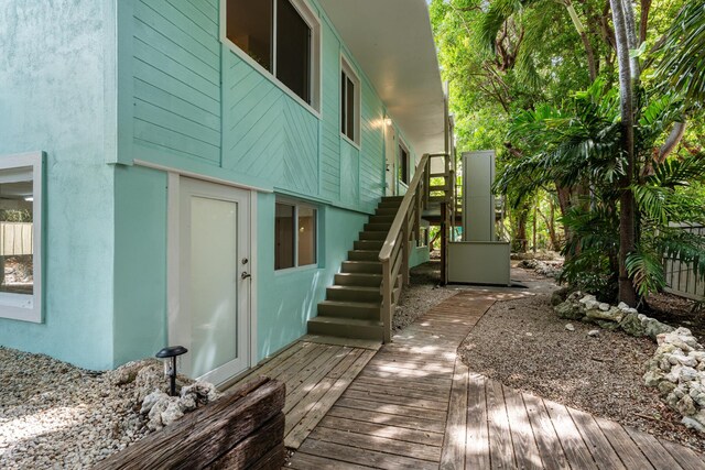 82260 Overseas Hwy, Islamorada, FL 33036 - entrance to property with stucco siding and a deck