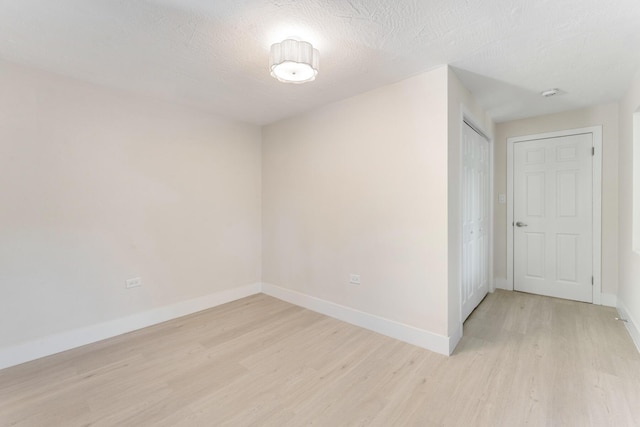 82260 Overseas Hwy, Islamorada, FL 33036 - spare room featuring light wood-type flooring and a smoke detector