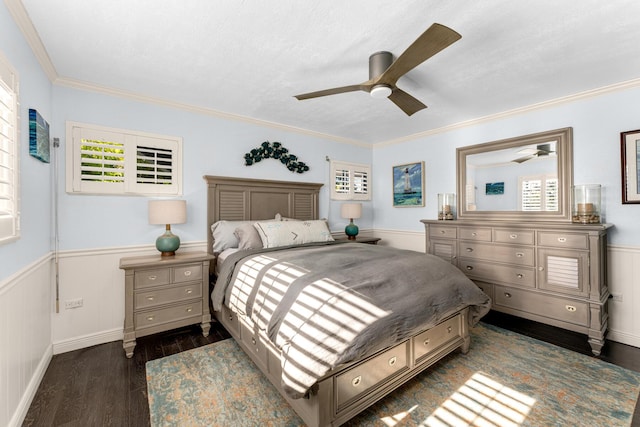 bedroom featuring dark hardwood / wood-style flooring, crown molding, a textured ceiling, and ceiling fan