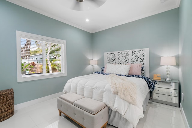 bedroom featuring light tile patterned floors, ceiling fan, baseboards, and ornamental molding