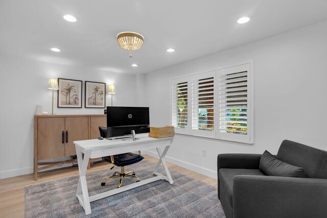 home office featuring light hardwood / wood-style floors