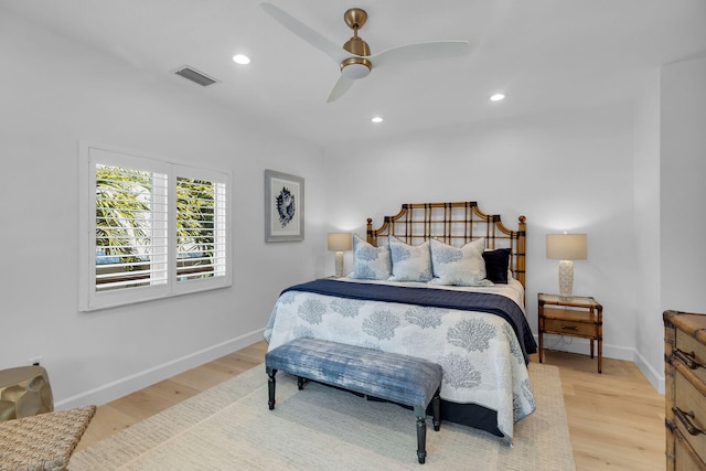 bedroom featuring ceiling fan and light hardwood / wood-style floors