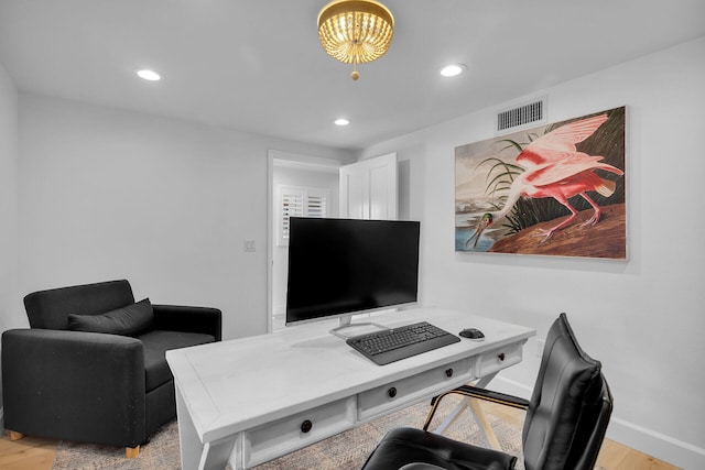 office area featuring light hardwood / wood-style floors