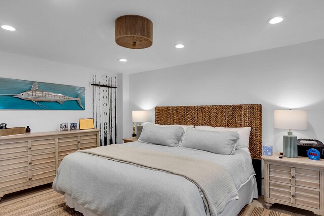 bedroom with light hardwood / wood-style floors