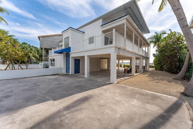 view of front of home with a balcony