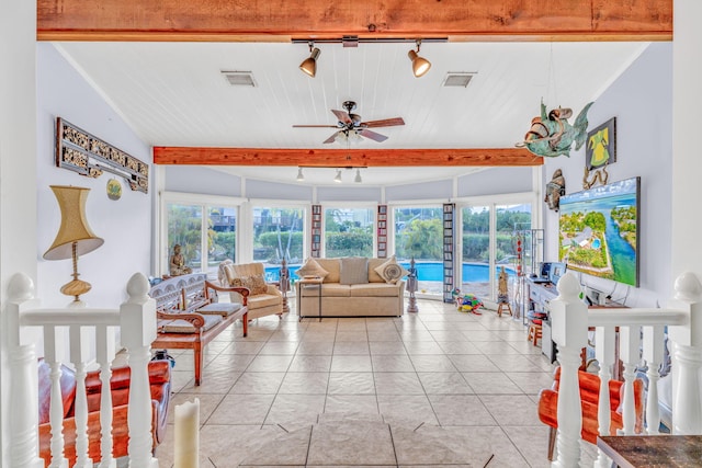 living room featuring rail lighting and ceiling fan