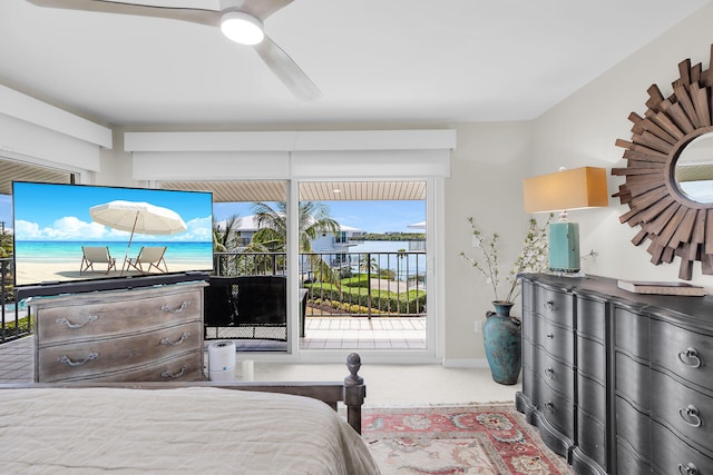 12690 Overseas Hwy Unit 411, Marathon, FL 33050 - carpeted bedroom with access to outside and ceiling fan