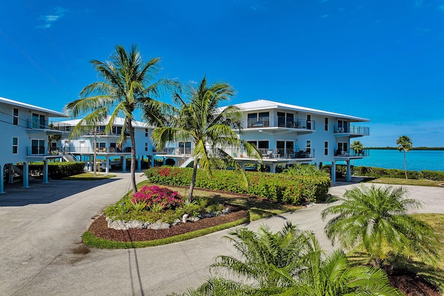 12690 Overseas Hwy Unit 411, Marathon, FL 33050 - view of property featuring a carport, driveway, and a water view