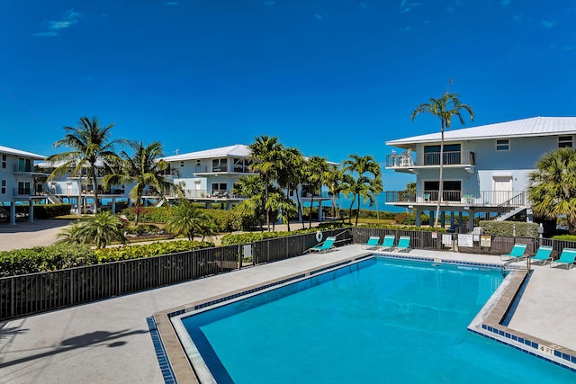12690 Overseas Hwy Unit 411, Marathon, FL 33050 - community pool featuring fence and a patio area