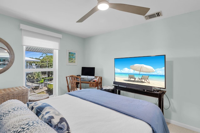 12690 Overseas Hwy Unit 411, Marathon, FL 33050 - bedroom featuring a ceiling fan, carpet flooring, and baseboards