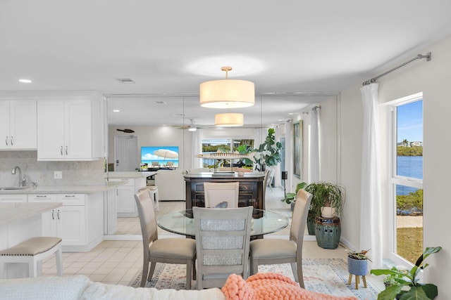 12690 Overseas Hwy Unit 411, Marathon, FL 33050 - dining area with light tile patterned flooring and recessed lighting