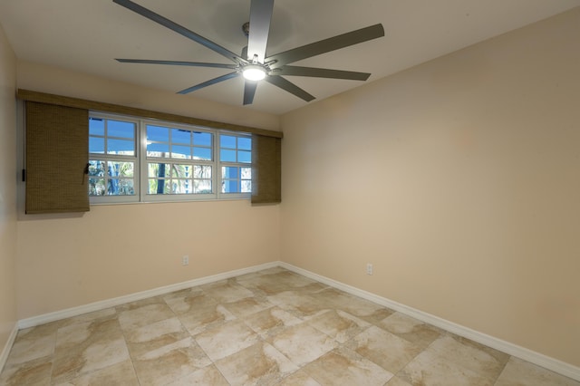 unfurnished room with ceiling fan