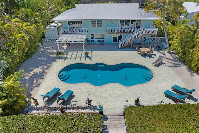 view of pool featuring a patio