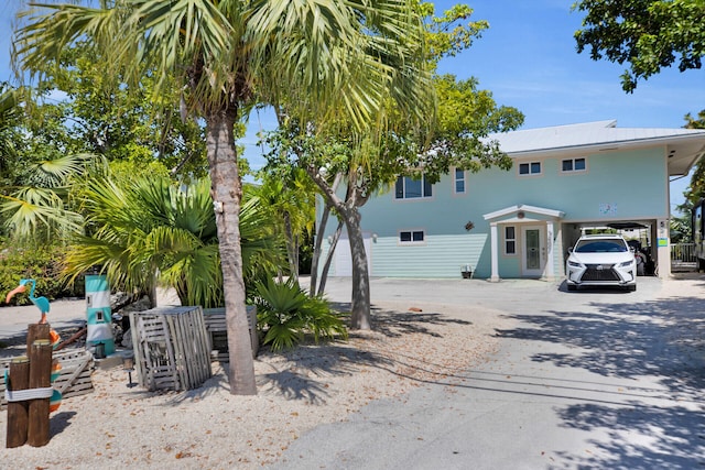 view of front of home featuring a carport