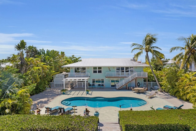 view of pool with a patio