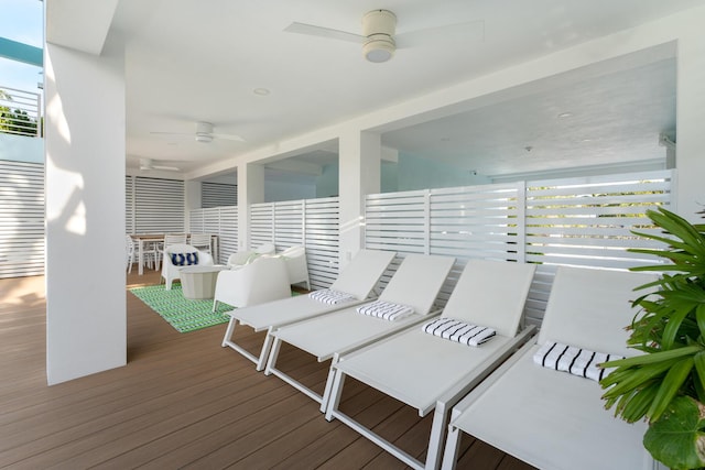 wooden deck with ceiling fan