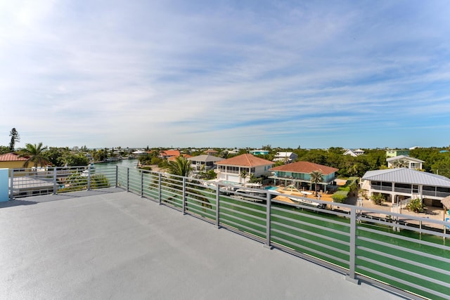 view of patio featuring a water view