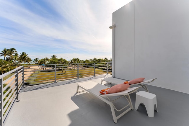 view of patio / terrace with a balcony