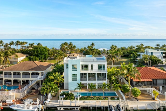 drone / aerial view with a water view