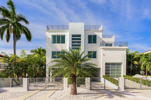 314 E Seaview Dr, Duck, FL 33050 - view of property with fence and a garage