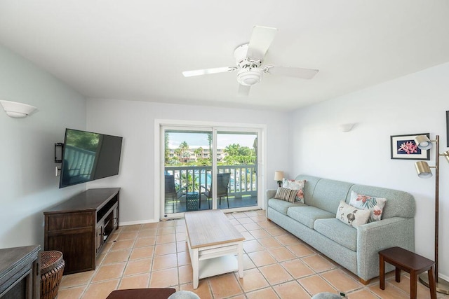 tiled living room featuring ceiling fan