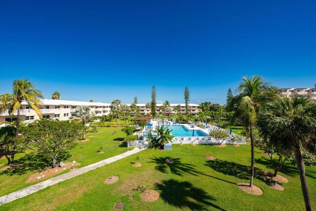 view of home's community featuring a pool