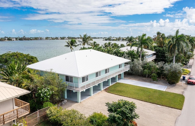 drone / aerial view with a water view