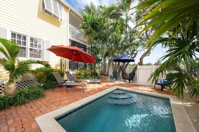 view of pool featuring a patio