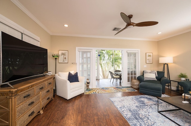 living room featuring ornamental molding, dark hardwood / wood-style floors, and ceiling fan