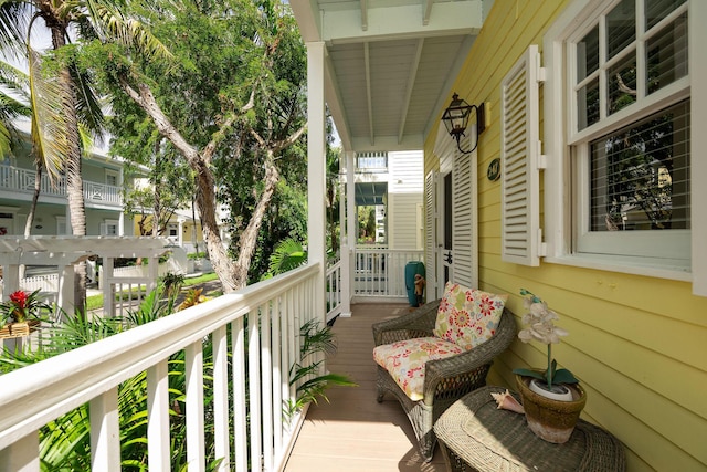 balcony featuring a porch