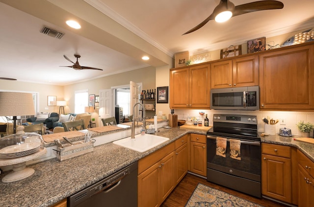 kitchen featuring sink, electric range oven, dark stone countertops, black dishwasher, and ceiling fan